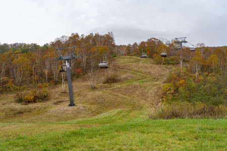 View of mountains and valleys from the Dragondola (Naeba-Tashiro Gondola) in autumn foliage season. Longest aerial gondola lift line in Japan.のeditorial素材