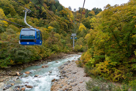 View of mountains and valleys from the Dragondola (Naeba-Tashiro Gondola) in autumn foliage season. Longest aerial gondola lift line in Japan.のeditorial素材