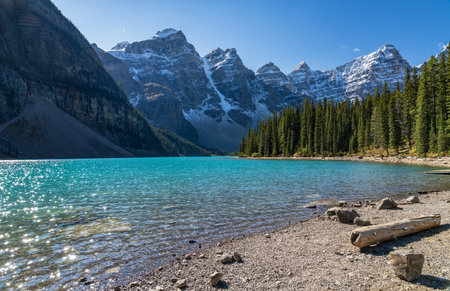 Moraine lake beautiful landscape in summer to early autumn sunny day morning. Sparkle turquoise blue water, snow-covered Valley of the Ten Peaks. Banff National Park, Canadian Rockies, Alberta, Canadaの写真素材