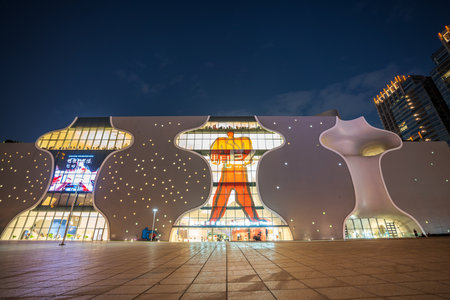 Exterior front view of National Taichung Theater light up at night. Taichung City, Taiwan.のeditorial素材