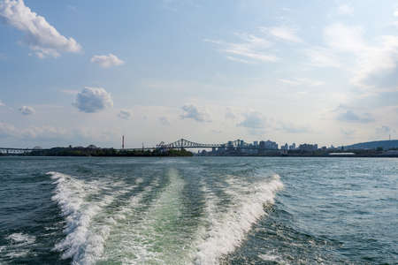 Montreal Jacques Cartier Bridge from a boat. Montreal, Quebec, Canada.のeditorial素材