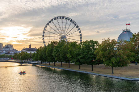 Old Port of Montreal and downtown skyline in summer dusk. Quebec, Canada.のeditorial素材