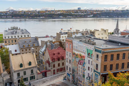 Quebec, Canada-October 20 2021: Fresco Wall Art in the Quebec City Old Town in autumn sunny day. Mural of Quebecers.のeditorial素材