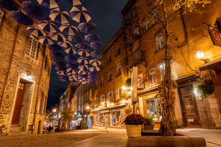 Quebec, Canada-October 18 2021: Umbrella Alley. Quebec City Old Town street view in autumn night.のeditorial素材