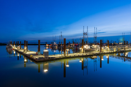 Richmond, BC, Canada-MAR 03 2021: Steveston Harbour Fisherman's Wharf at night.のeditorial素材