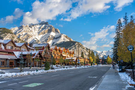 Banff High School Transit Hub bus stop. Banff Avenue in a snowy sunny day. Canadian Rockies. Banff, Canadaのeditorial素材
