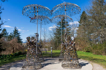 Vancouver, BC, Canada - April 12 2021 : Queen Elizabeth Park Love Locks Statues.のeditorial素材