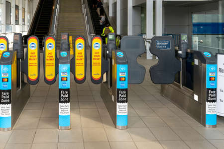 Richmond, British Columbia, Canada - MAR 11 2021 : The fare pay zone exit gate of Richmond-Brighouse SkyTrain Station.のeditorial素材