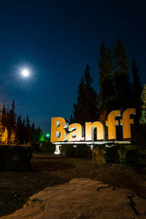 Banff Town Sign in summer night. Banff National Park, Canadian Rockies. Banff, Canada
