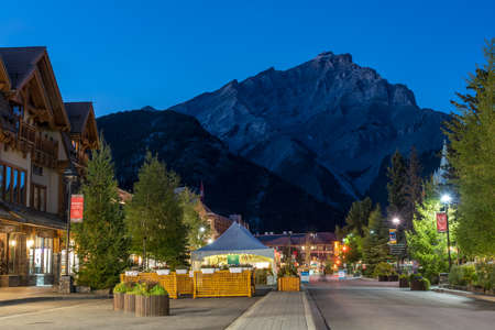 Banff, Alberta, Canada - SEP 07 2020 : Banff Avenue street view in summer night, during pandemic period not much tourists on the road. Banff National Park, Canadian Rockies.のeditorial素材