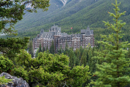 Banff, Alberta, Canada - AUG 28 2020 : Fairmont Banff Springs in summer sunny day. View from Surprise Corner Viewpoint. Banff National Park, Canadian Rockies.のeditorial素材