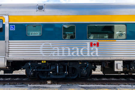 Jasper, Alberta, Canada - May 1 2021 : Via Rail F40PH-2D public passenger train stop at the Jasper...