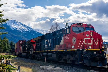 Jasper, Alberta, Canada - May 1 2021 : Canadian National Railway freight train. Canadian Rockies,...