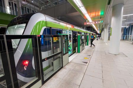 Taichung City, Taiwan - July 3, 2022 : Taichung MRT Metro system Green line train stop at the Shui-an Temple metro station platform screen doors.のeditorial素材