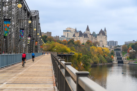 Ottawa, Ontario, Canada - October 16 2021 : People cycling and walking on Alexandra Bridge Trans...