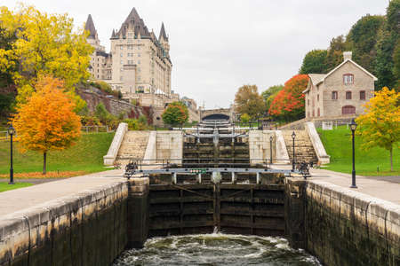 Rideau Canal Rideau Waterway autumn red leaves scenery. Fall foliage in Ottawa, Ontario, Canada.の写真素材