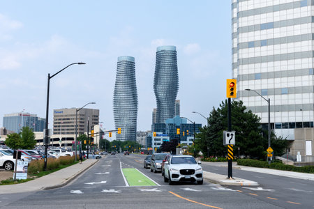 Mississauga, Ontario, Canada - July 18 2021 : Street view of City of Mississauga centre downtown. Landmarks Absolute Condos in the background.のeditorial素材