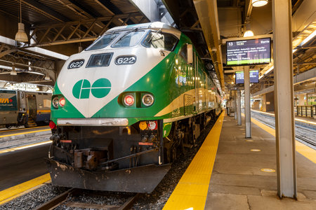 Toronto, Ontario, Canada - July 25 2021 : GO Transit Go Train arriving at Union Station platform.のeditorial素材