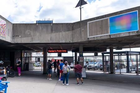 Toronto, Ontario, Canada - July 30 2021 : Jack Layton Ferry Terminal, Passengers queue at the Island Ferry Dock. Hanlan's Point Ferry wharf.のeditorial素材
