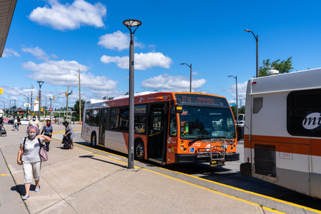 Mississauga, Ontario, Canada - July 25 2021 : Mississauga City Centre Transit Terminal Bus Platform.のeditorial素材