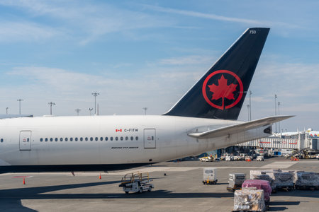 Vancouver, Canada - Oct 9, 2023 : Air Canada Boeing 777-300ER (77W) aircraft airplane parked at the airportのeditorial素材