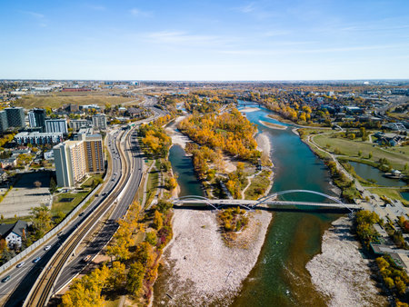 St. Patrick's Island Park and Bow River and Memorial Drive aerial view in autumn season. Fall foliage in City of Calgary, Alberta, Canada. George C. King Bridge.の写真素材