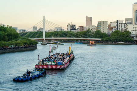 Osaka, Japan - July 25 2023 : Tenjin Matsuri Festival. Festival boats along Okawa River.のeditorial素材
