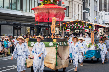 Kyoto, Japan - July 24 2023 : Gion Matsuri Festival, Hanagasa Junko Parade. Flower Umbrella Procession of float parade on the city street.のeditorial素材