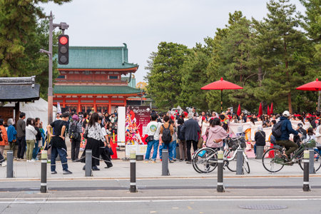 Kyoto, Japan - March 31 2024 : Kyoto Sakura Yosakoi ( Sakuyosa ) festival at the Okazaki area around Heian Shrine. Crowd of people watching the dancing performance.のeditorial素材