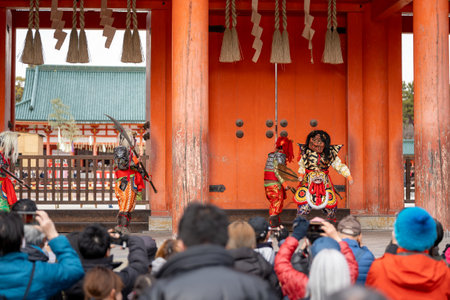 Kyoto, Japan - February 3 2024 : Heian Jingu Shrine Setsubun festival. Performers wearing an oni ( demon or ogre ) costume in the traditional Japanese shinto ritual ceremony.のeditorial素材