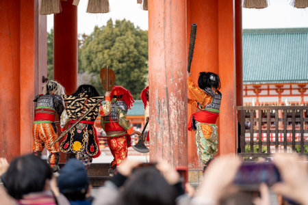 Kyoto, Japan - February 3 2024 : Heian Jingu Shrine Setsubun festival. Performers wearing an oni ( demon or ogre ) costume in the traditional Japanese shinto ritual ceremony.のeditorial素材