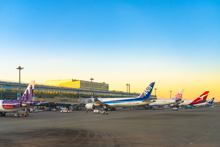 Tokyo Haneda International Airport in the sunrise time. Near the Keihin industry region. Tokyo, Japanのeditorial素材