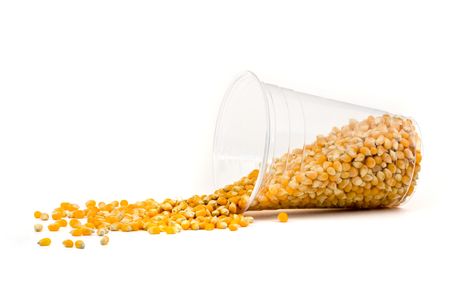 Cup made from corn with cord seeds on white backgroundの写真素材