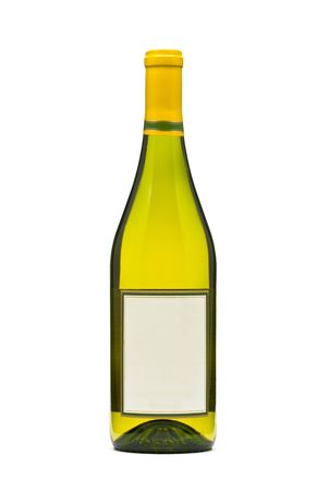 Filled white wine bottle over white bacgroundの写真素材