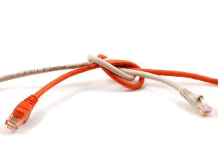 Network error concept with LAN cables over white backgroundの写真素材