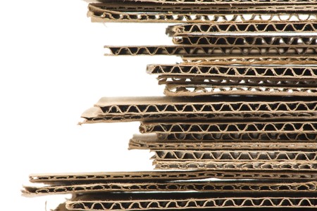 Close up of stacked brown recycled cartonの写真素材