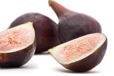 Closeup of delicious organic figs over white backgroundの写真素材