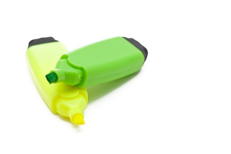 Green and yellow open text marker over white backgroundの写真素材