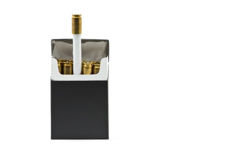 Pack of cigarettes with bullet casing filters - smoking kills conceptの写真素材