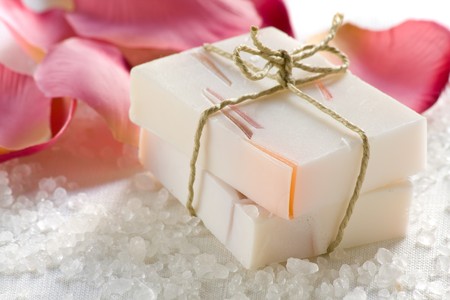 Handmade rose scented soap with bathing salt and rose petalsの写真素材