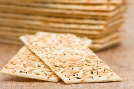 Close up of sesame crackers on wooden backgroundの写真素材