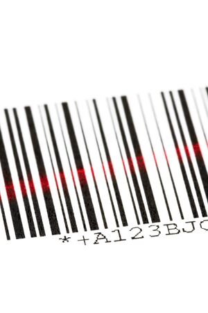 Digital bar code scanned by laser over white backgroundの写真素材