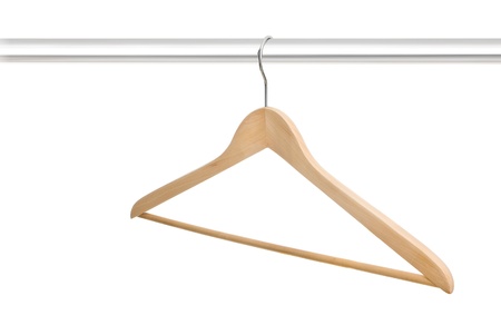 Single wooden empty hanger on rack isolated on white backgroundの写真素材