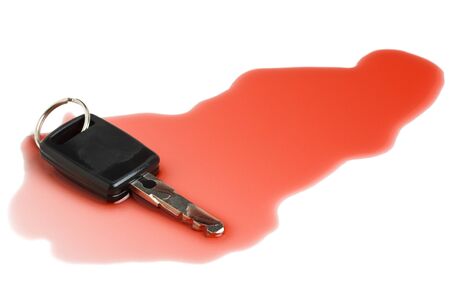 Car key in red wine - concept for don't drink and driveの写真素材