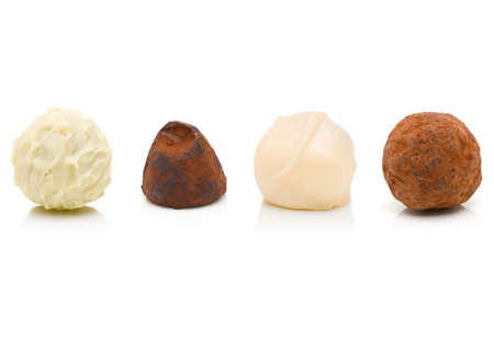 Delicious belgian chocolate truffels over white backgroundの写真素材