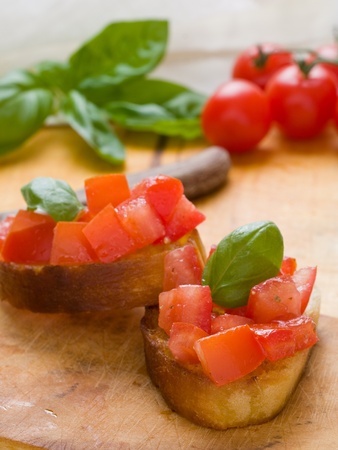 Delicious italian tomato bruschetta on toasted breadの写真素材