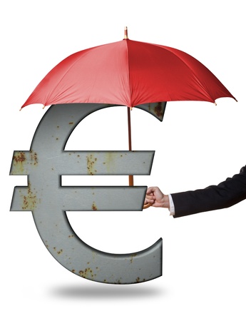Man holding red umbrella over rusty Euro sign - EU currency protection conceptの写真素材