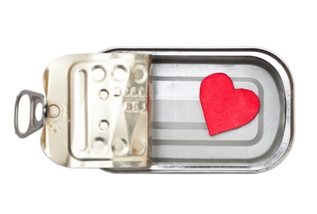 Little red heart in tin can isolated on whiteの写真素材