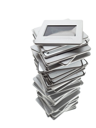 Stack of transparency slides over white background