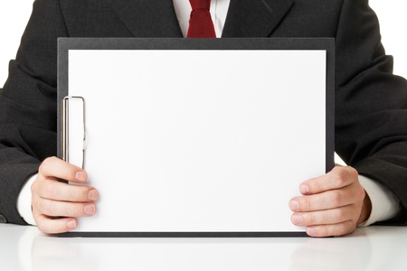 Businessman holding clipboard with empty piece of paper for copy or imagesの写真素材